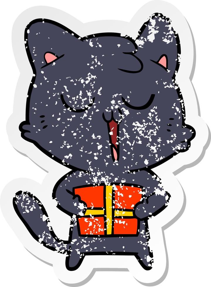 distressed sticker of a cartoon cat with present vector