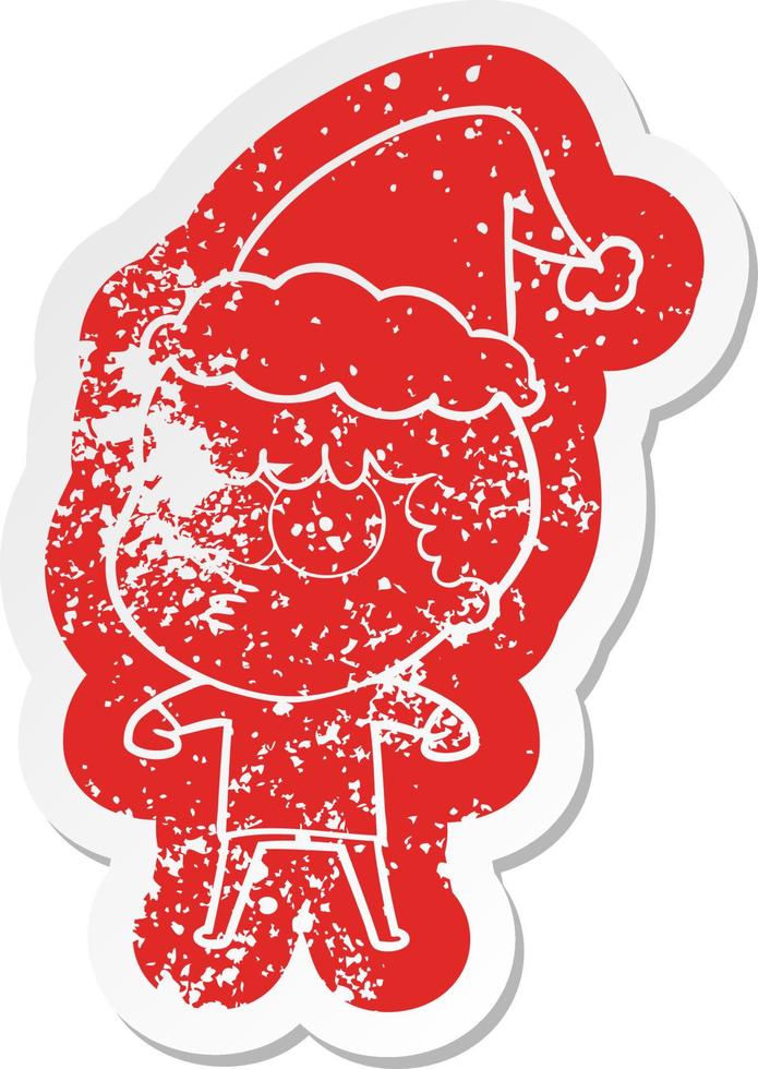 cartoon distressed sticker of a curious boy wearing santa hat vector