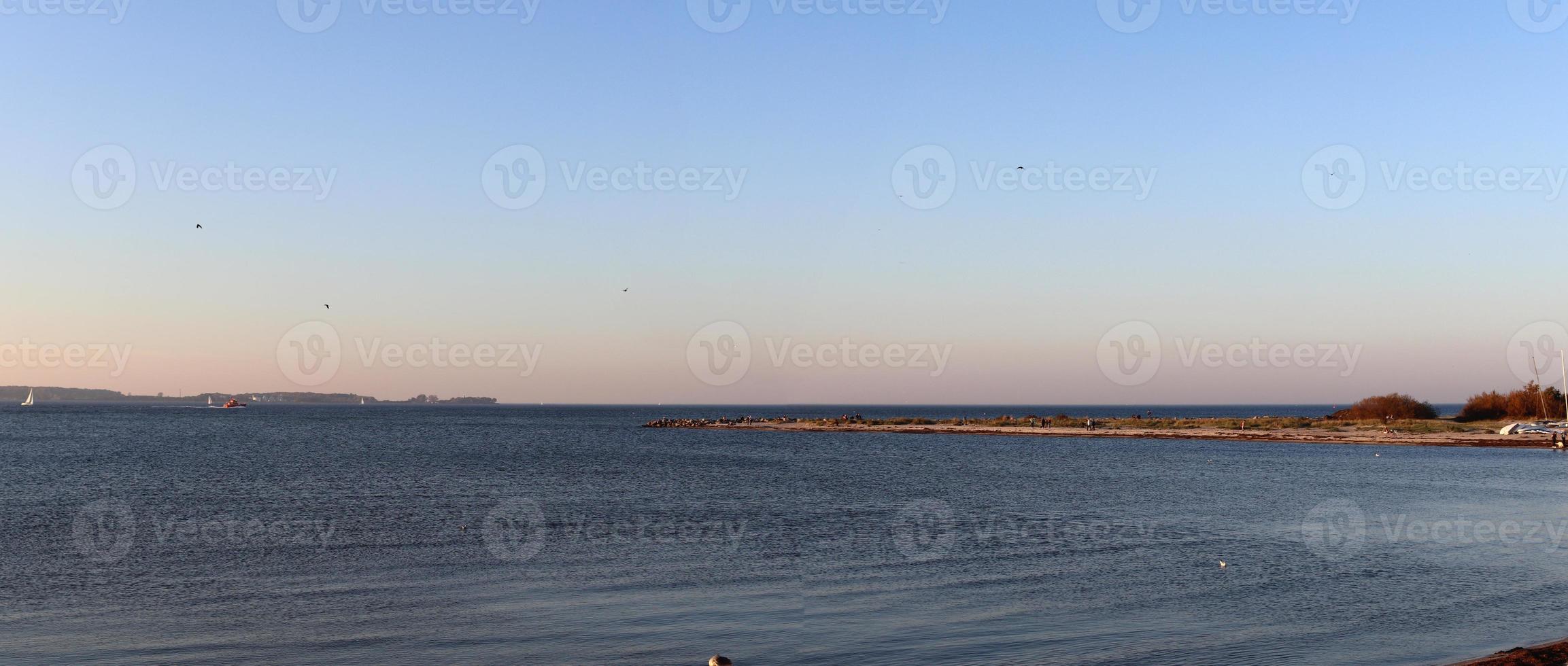 Beautiful view on sandy beaches at the baltic sea on a sunny day photo