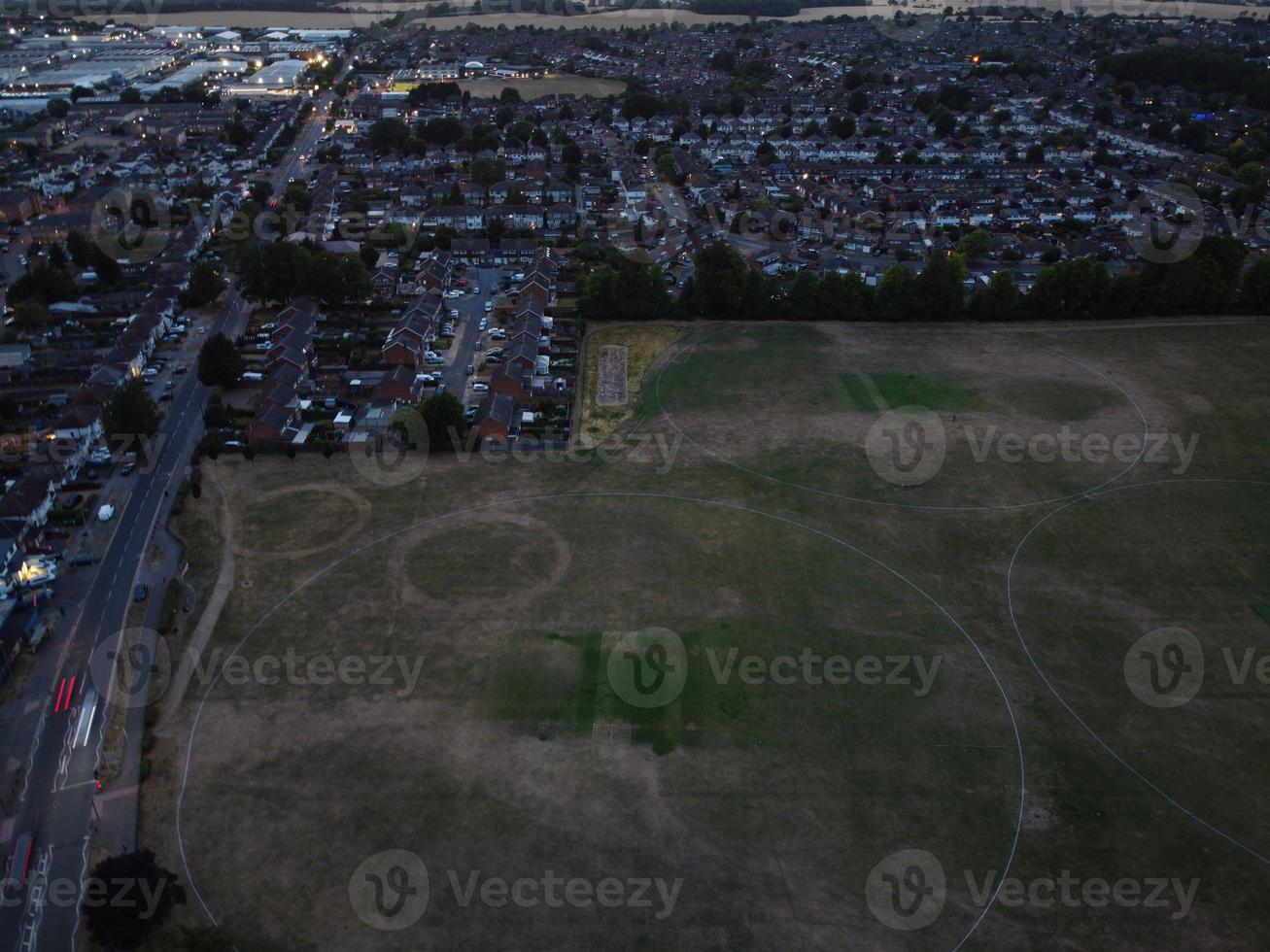 High angle aerial view of Luton City of England at Sunset Night. photo