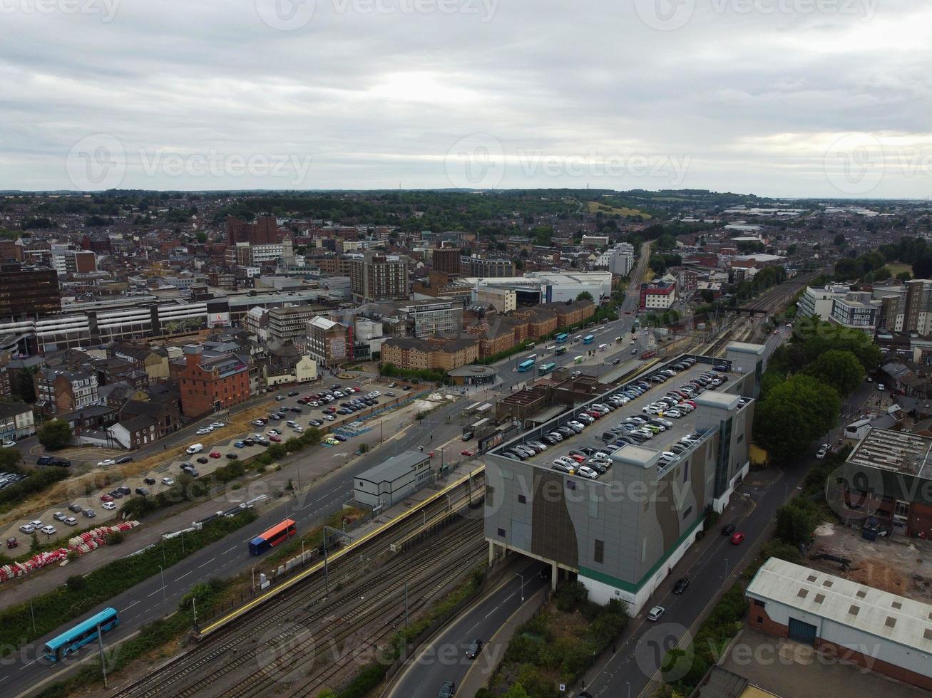 High Angle Footage of London Luton Town and Aerial view of Central Railway Station, Train Tracks of England UK photo