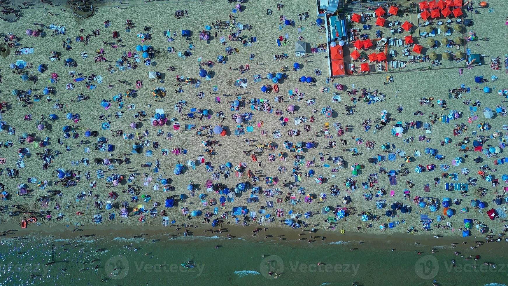 People relaxing at Bournemouth Beach of England UK photo