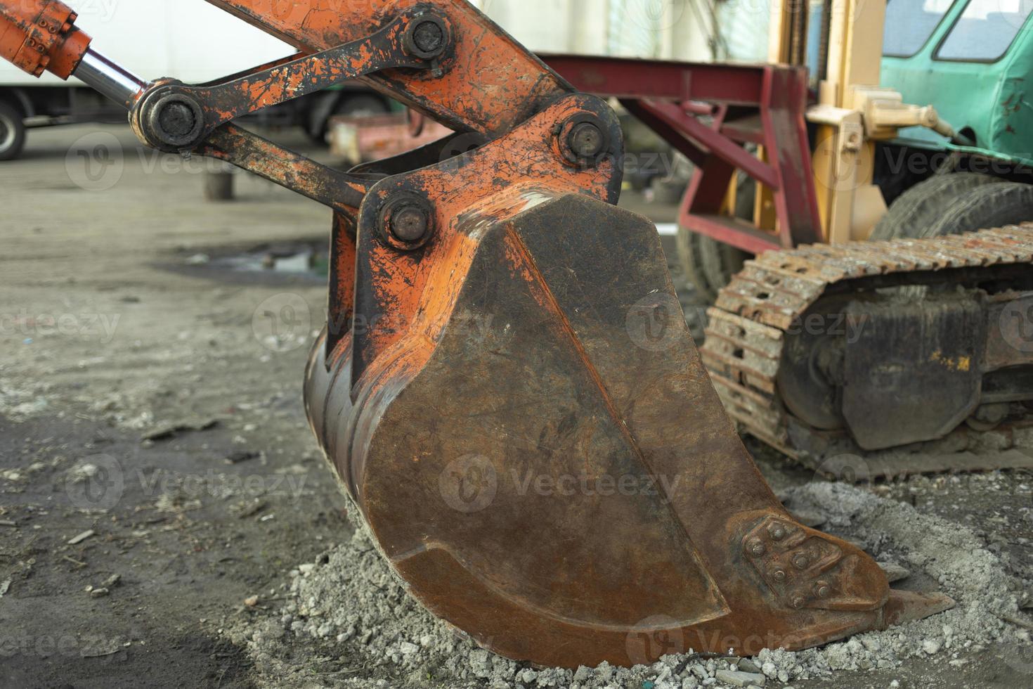 Escalator bucket. Heavy machinery. Rusty bucket. photo