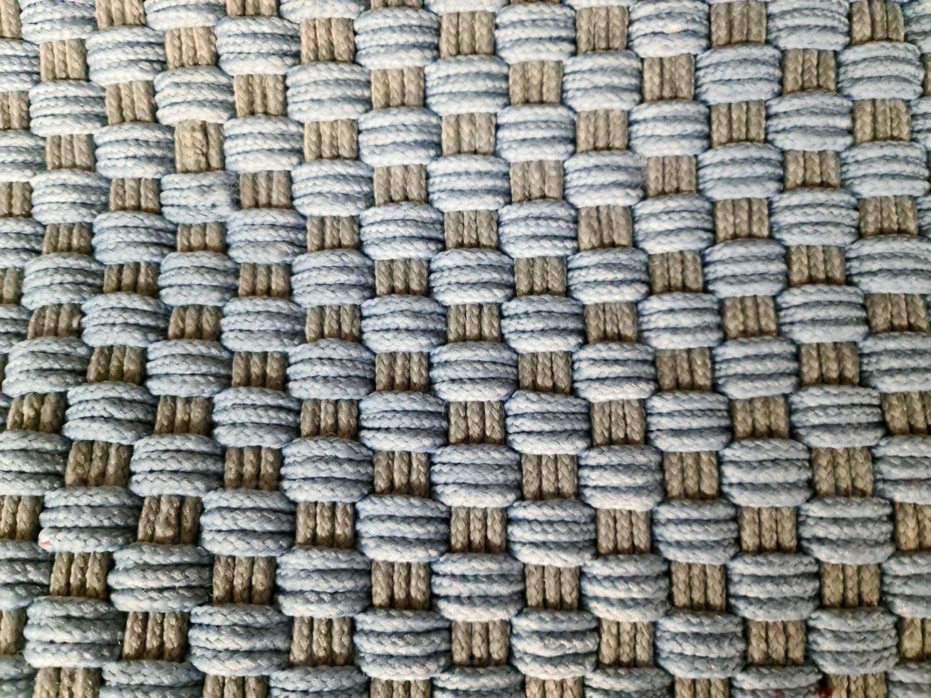 Detailed close up view on samples of cloth and fabrics in different colors found at a fabrics market photo