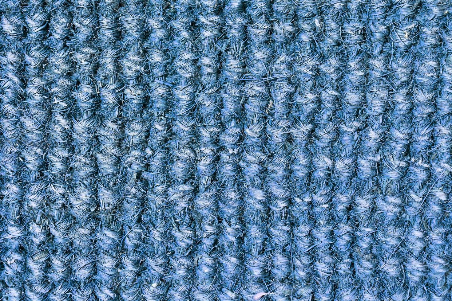 Detailed close up view on samples of cloth and fabrics in different colors found at a fabrics market photo