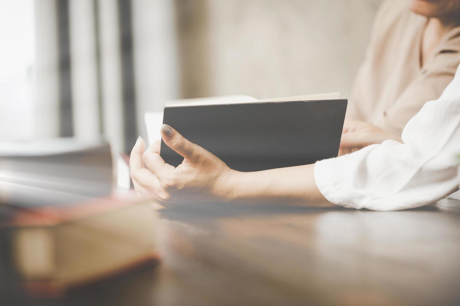 A woman is reading the bible photo