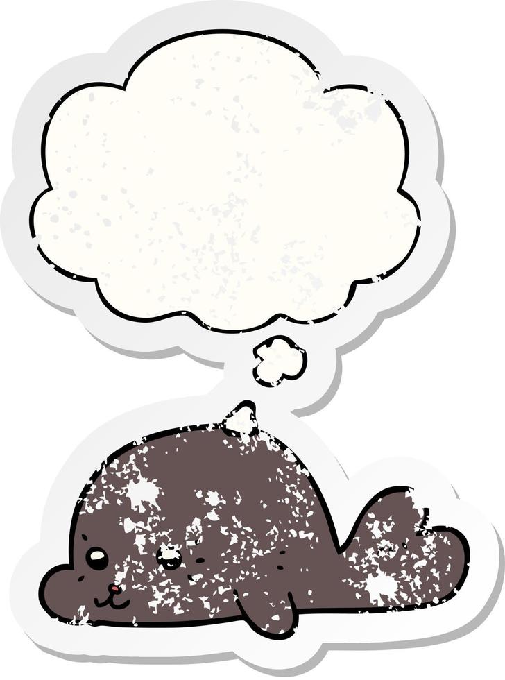 cartoon baby seal and thought bubble as a distressed worn sticker vector