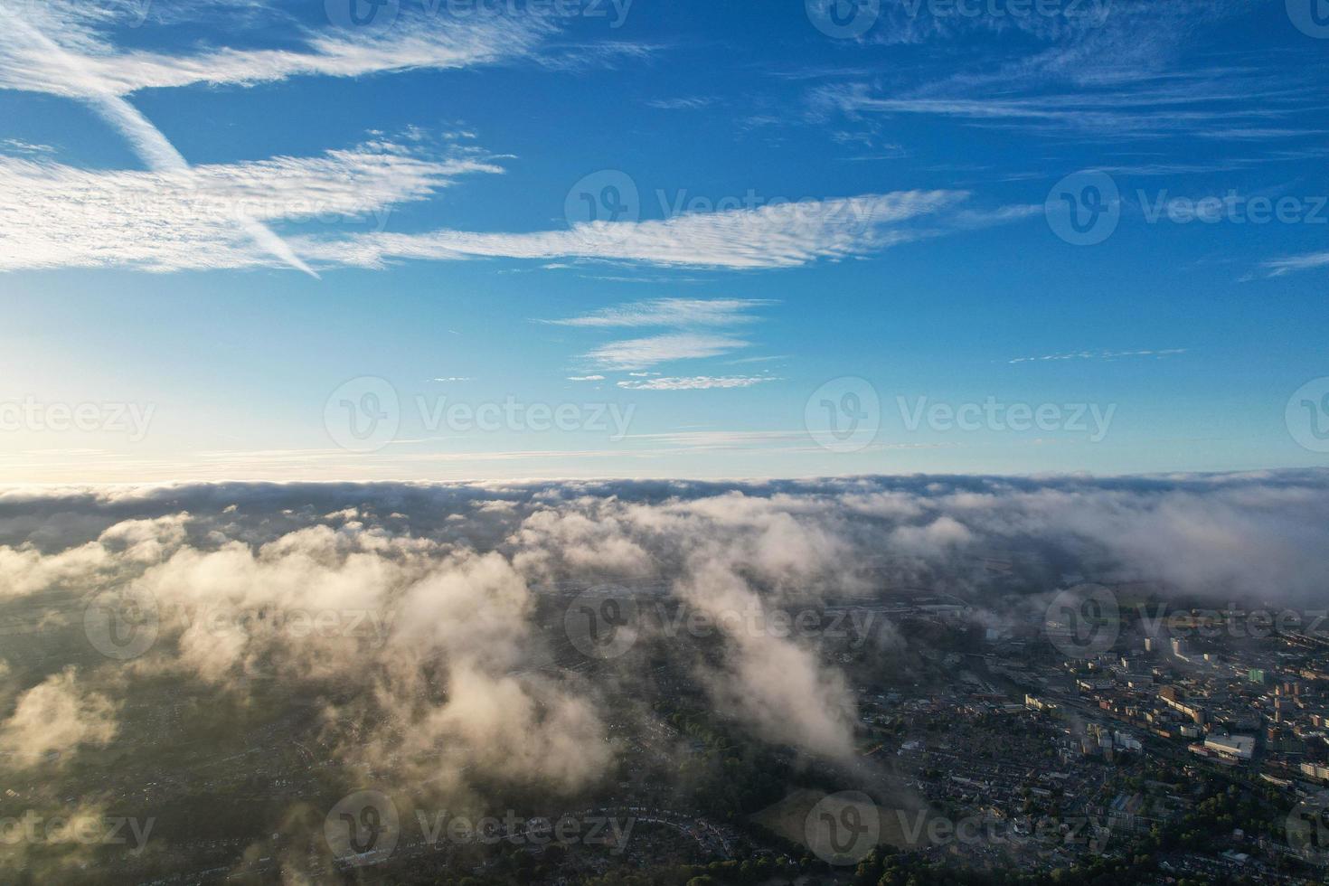 Aerial view of Clouds at Sunrise Morning time over Great Britain, drone's footage, Beautiful Morning with high winds and fast moving clouds photo