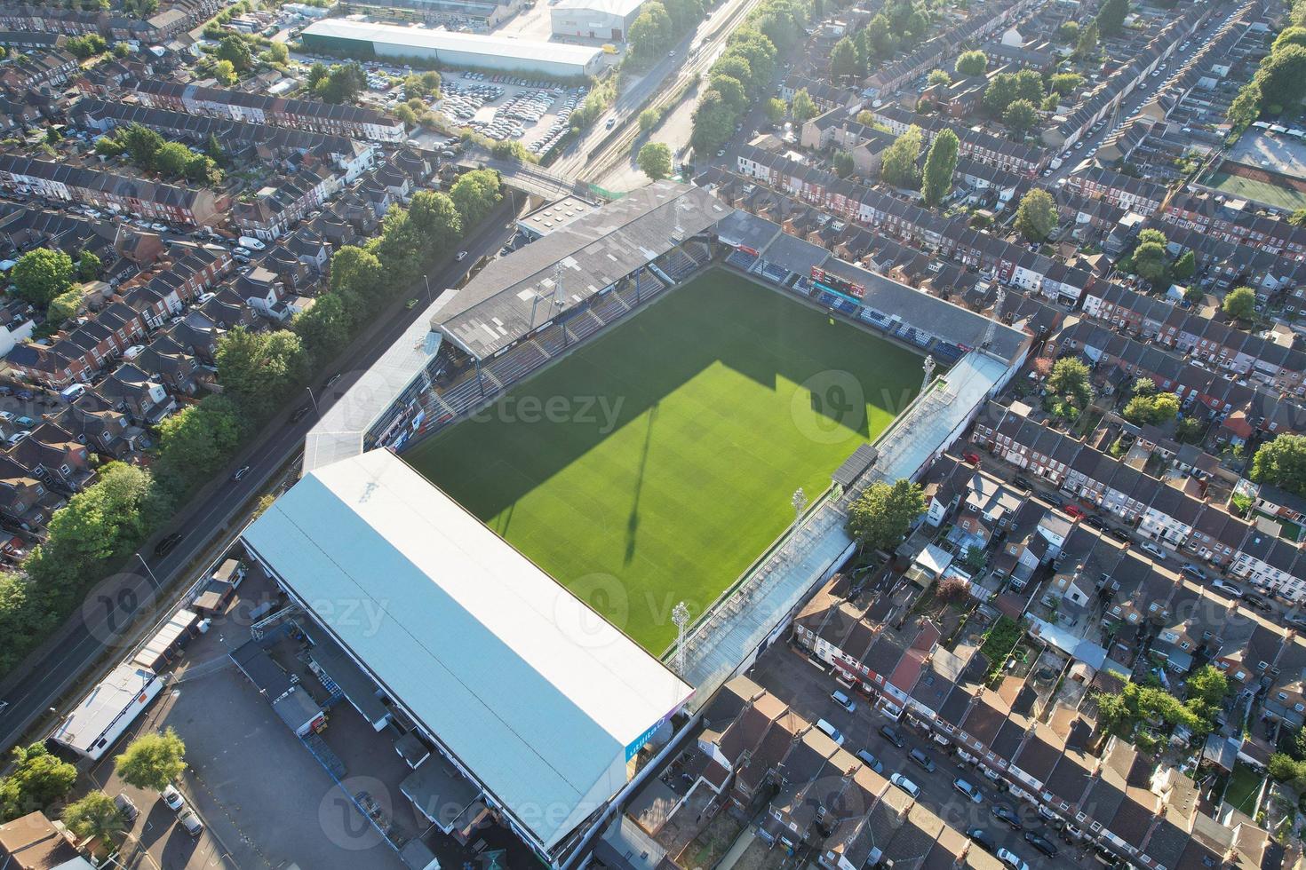 High Angle Drone's View of Luton City Center and Railway Station, Luton England. Luton is town and borough with unitary authority status, in the ceremonial county of Bedfordshire photo