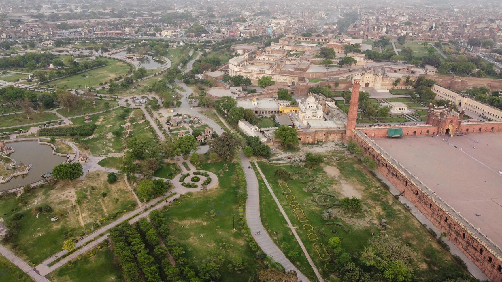 The Royal Mosque at Lahore Pakistan, Drone's High Angle View of Mughal era congregational mosque in Lahore, Punjab Pakistan photo