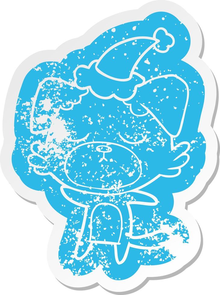 cute cartoon distressed sticker of a dog wearing santa hat vector