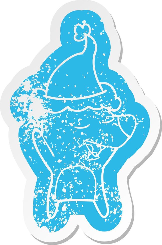 cartoon distressed sticker of a bear wearing santa hat vector