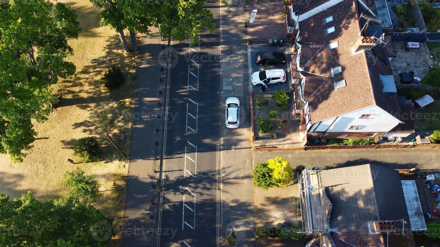 Aerial view of Water birds at lake of Wardown park and Residential area of Luton Town of England photo