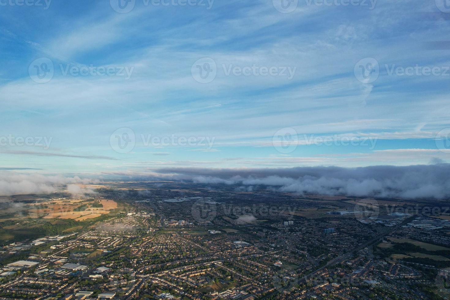 Aerial view of Clouds at Sunrise Morning time over Great Britain, drone's footage, Beautiful Morning with high winds and fast moving clouds photo