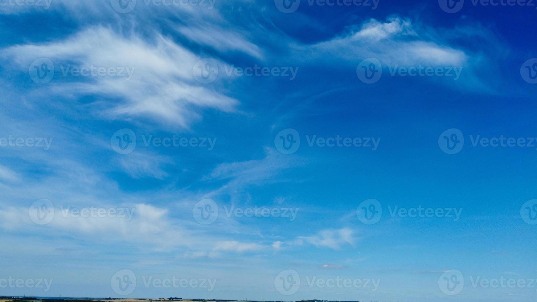 Beautiful Blue Sky and few clouds over Luton City of England on Hot Summer Day photo