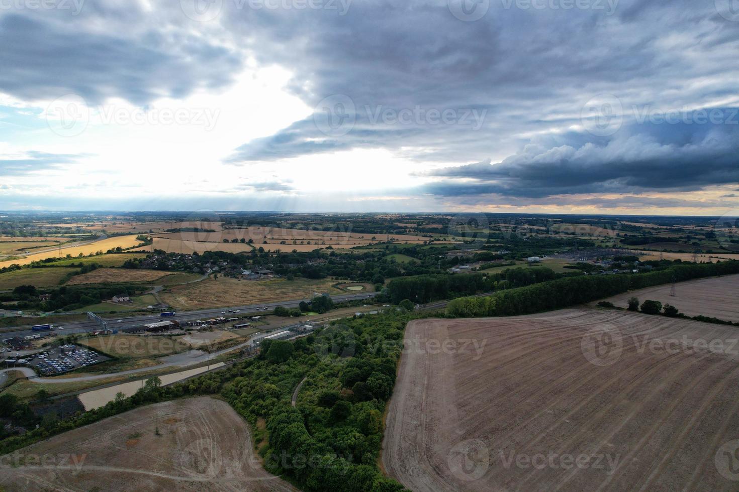 Aerial View and High Angle Footage of British Motorways Interchange of M1 Junction 11a at North Luton City of England UK. photo