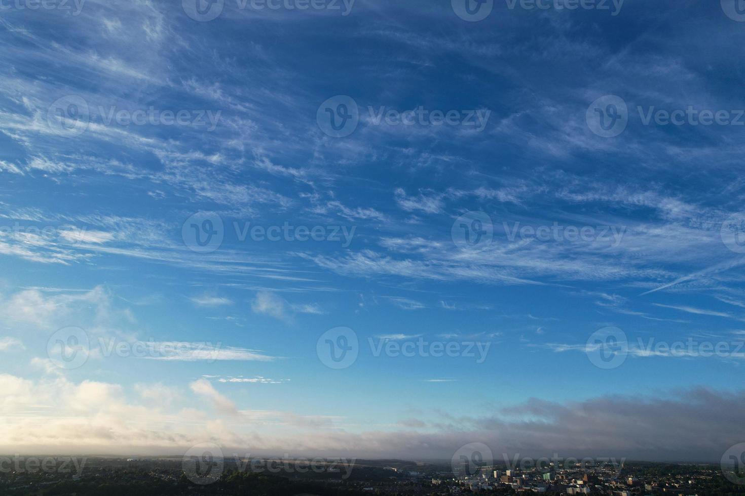 Aerial view of Clouds at Sunrise Morning time over Great Britain, drone's footage, Beautiful Morning with high winds and fast moving clouds photo