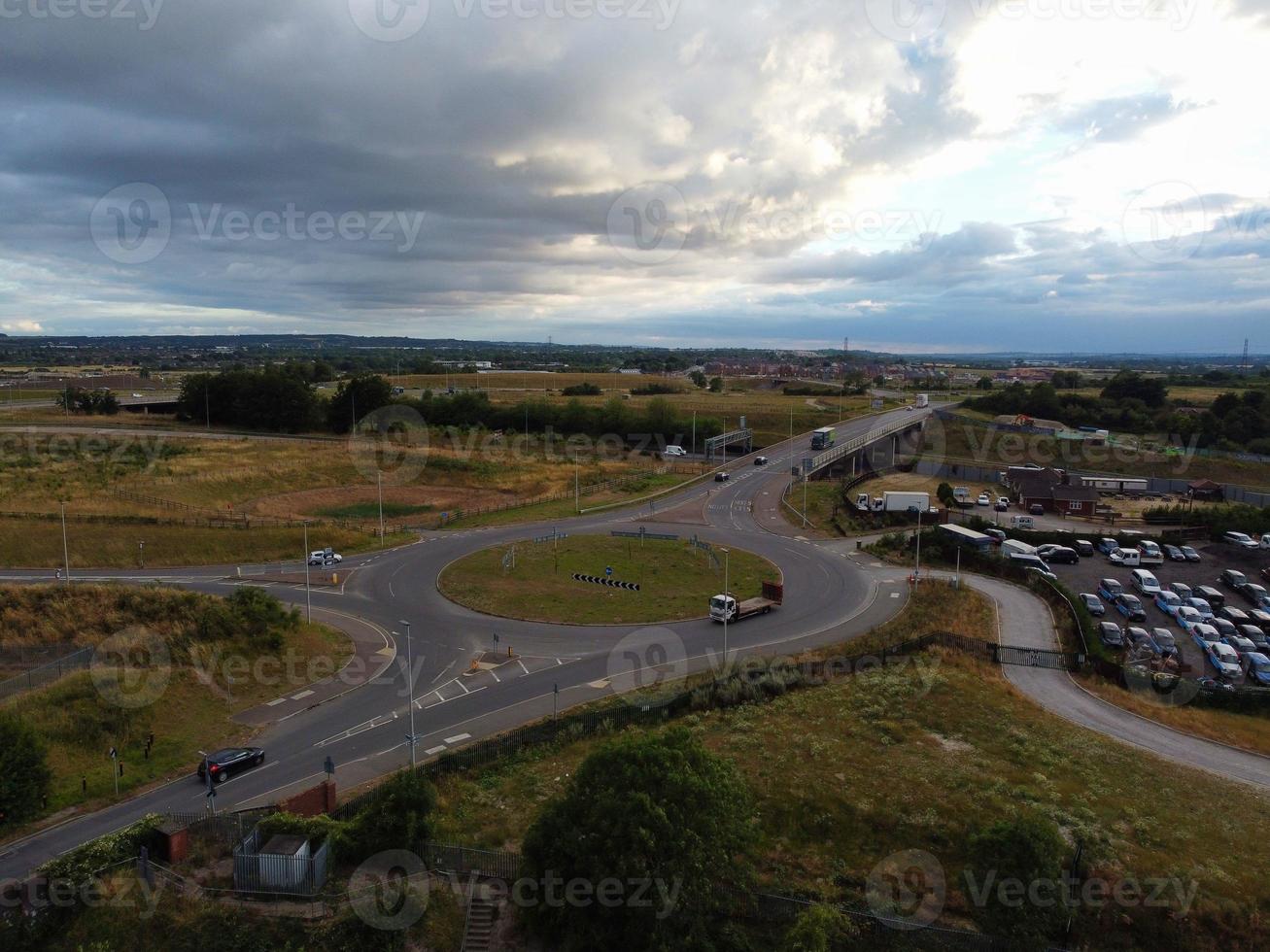 Aerial View and High Angle Footage of British Motorways Interchange of M1 Junction 11a at North Luton City of England UK. photo