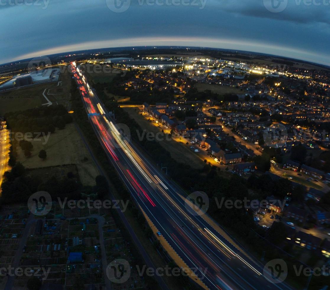 Beautiful Night Aerial View of British City, High Angle Drone's Footage of Luton Town of England UK photo