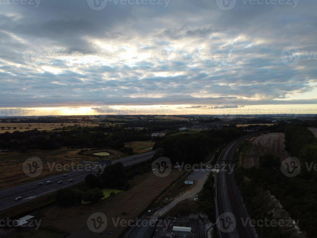 High Angle Aerial view of British Motorways and Train Tracks at North London Luton England UK photo