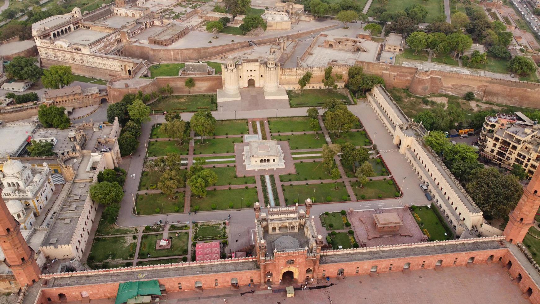 The Royal Mosque at Lahore Pakistan, Drone's High Angle View of Mughal era congregational mosque in Lahore, Punjab Pakistan photo