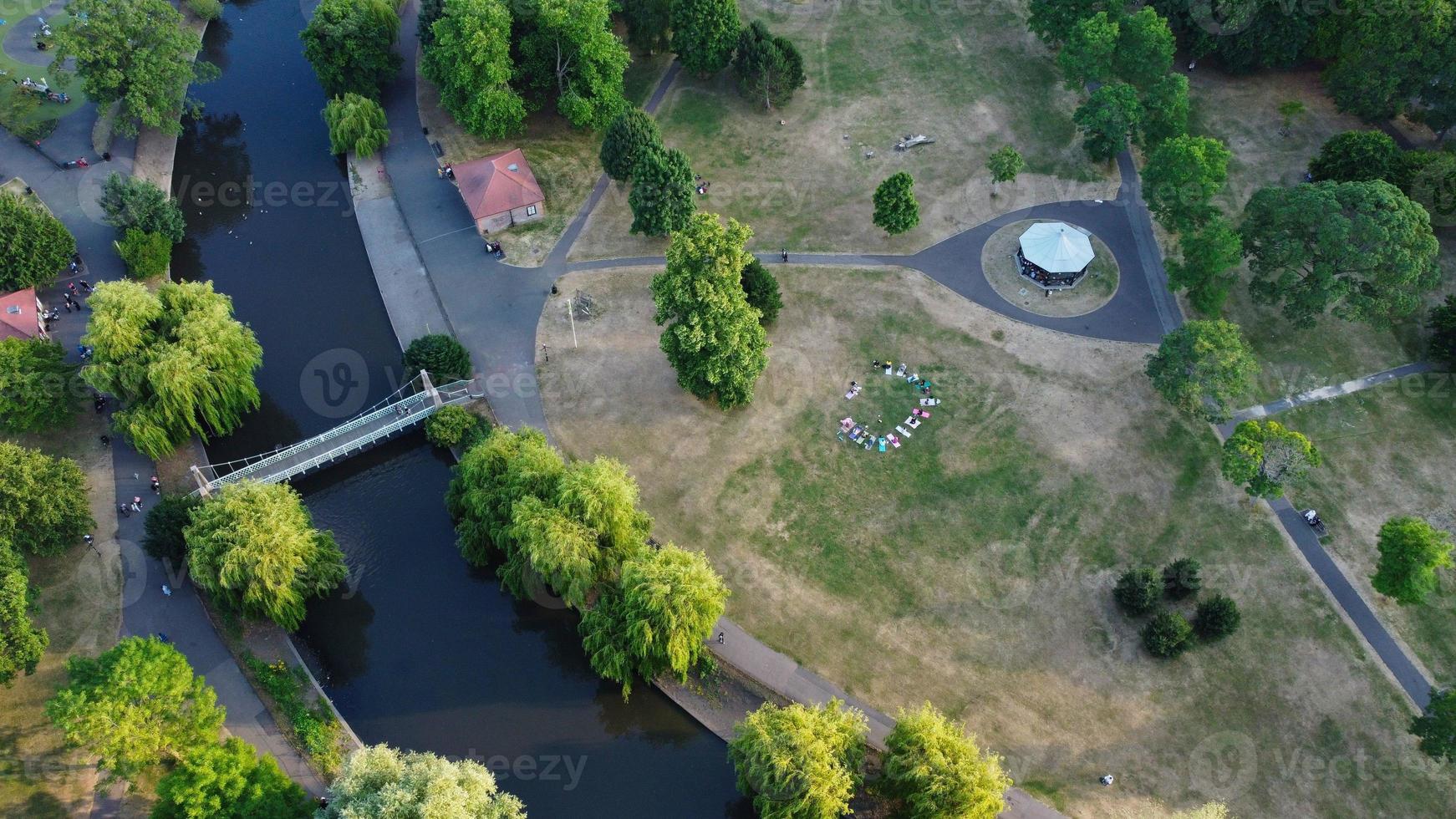 Aerial view of Water birds at lake of Wardown park and Residential area of Luton Town of England photo