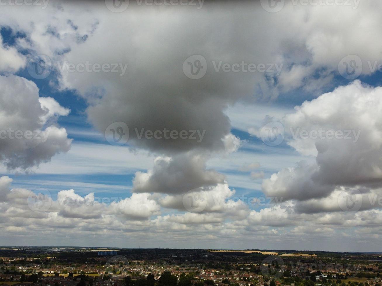 Most Beautiful Sky with Thick Clouds over British Town on a Hot Sunny Day photo