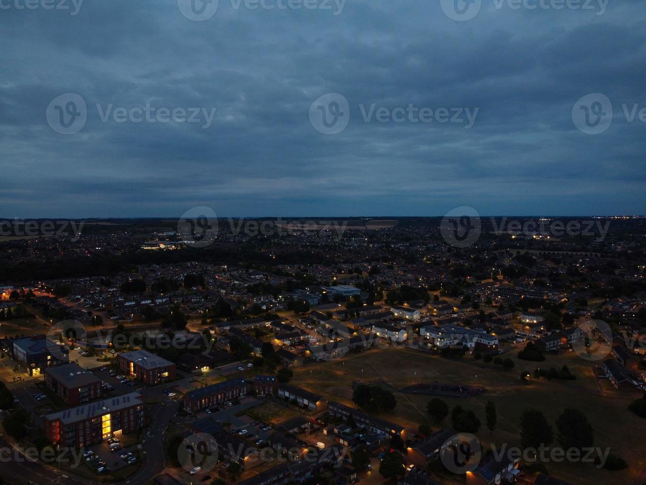 Aerial view high angle footage of Luton Town of England at Night photo