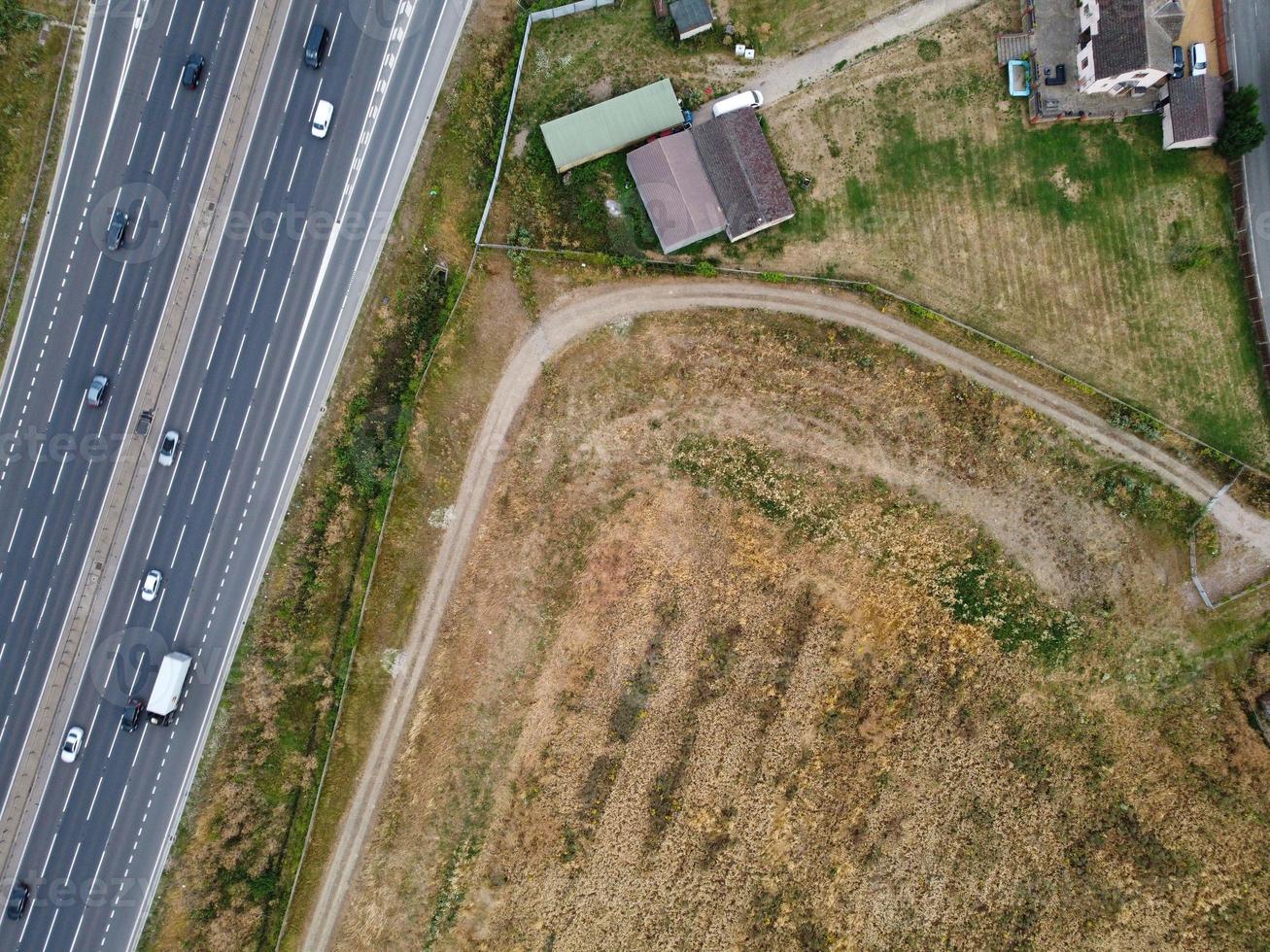Aerial footage of Countryside fields at M1 J11 Motorways Luton England UK photo