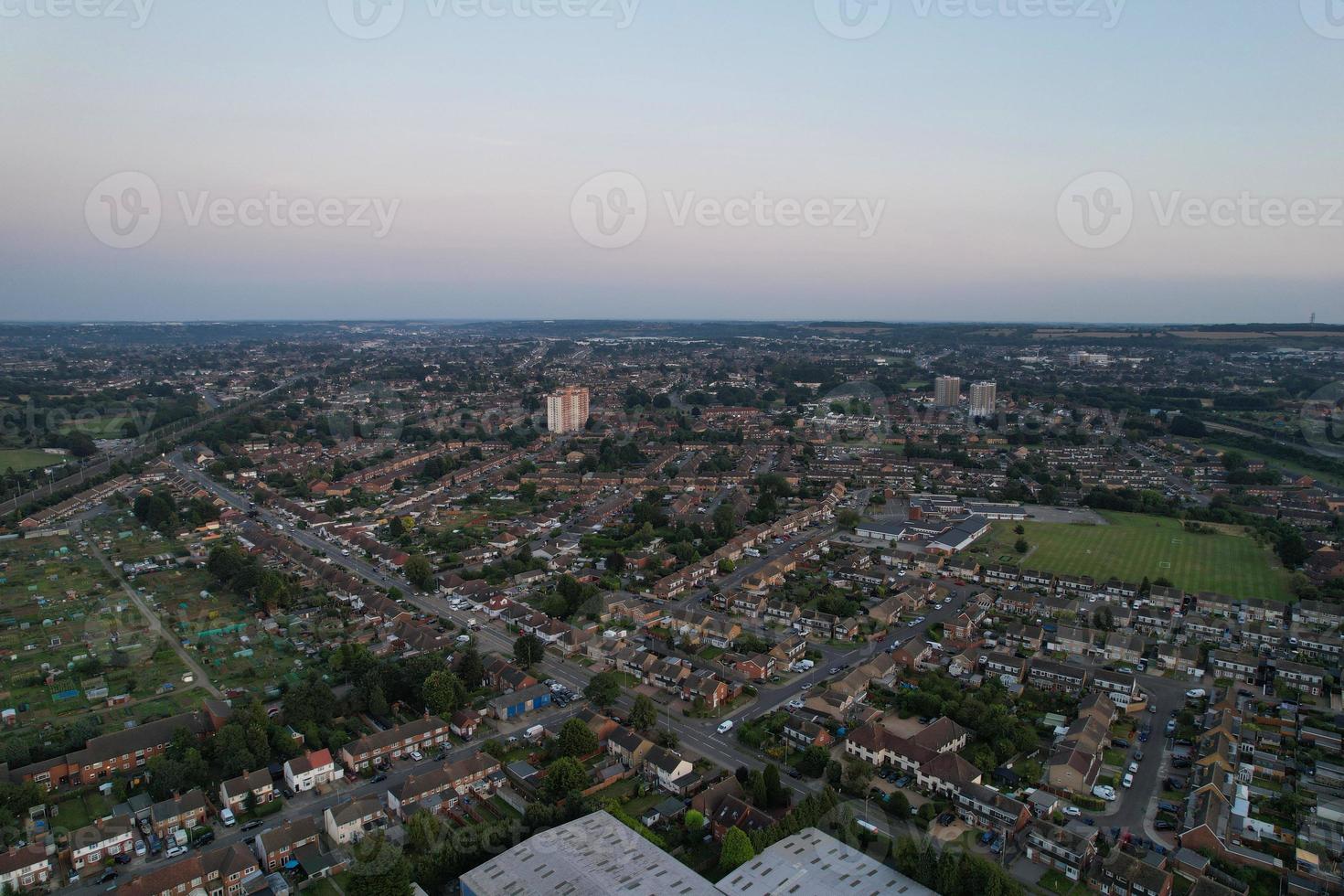 Gorgeous Aerial View of Luton City of England UK at Sunset Time, Colourful Clouds high angle footage taken by drone photo