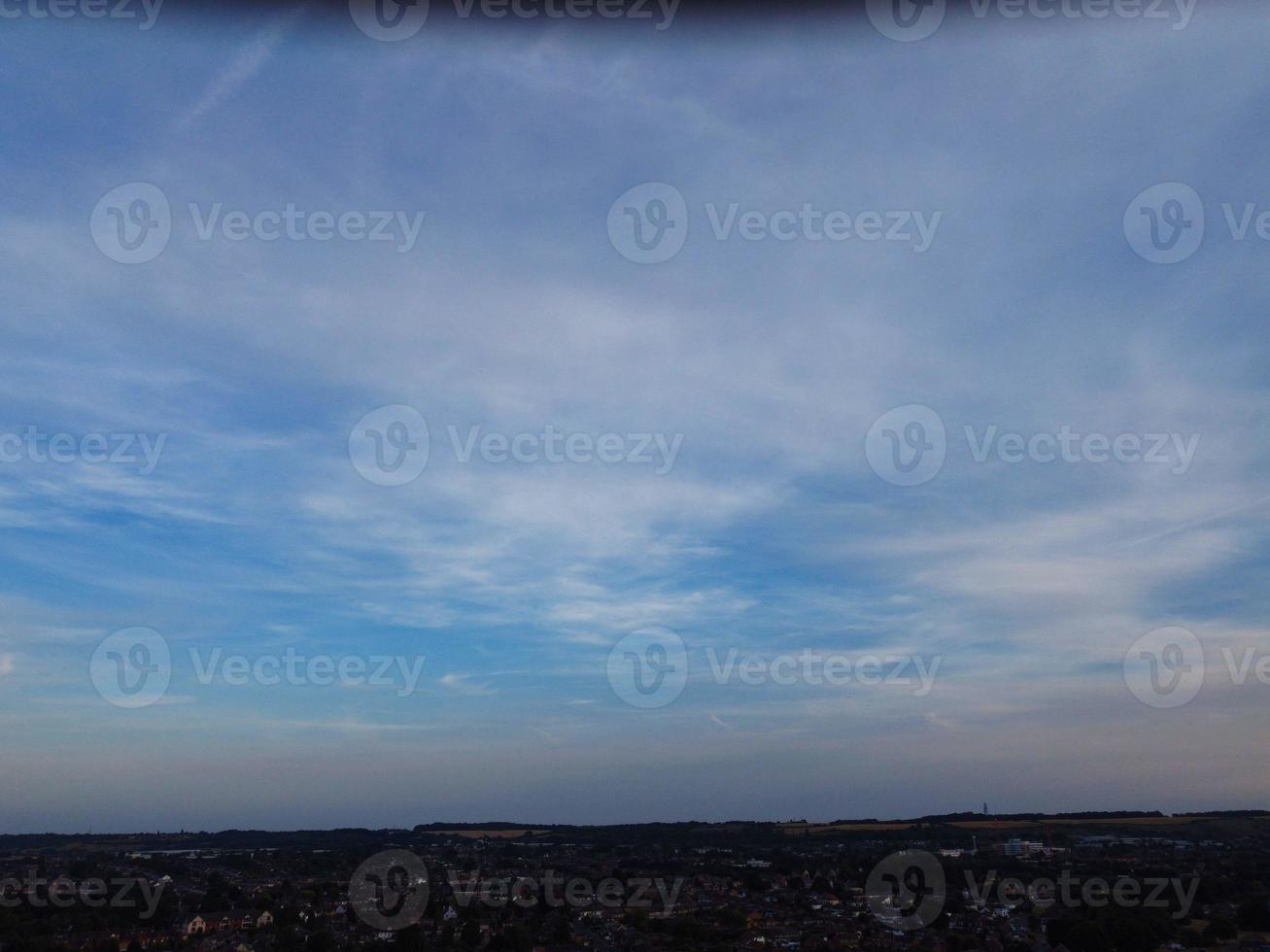 Aerial View of Luton City of England UK at Sunset Time, Colourful Clouds high angle footage taken by drone photo