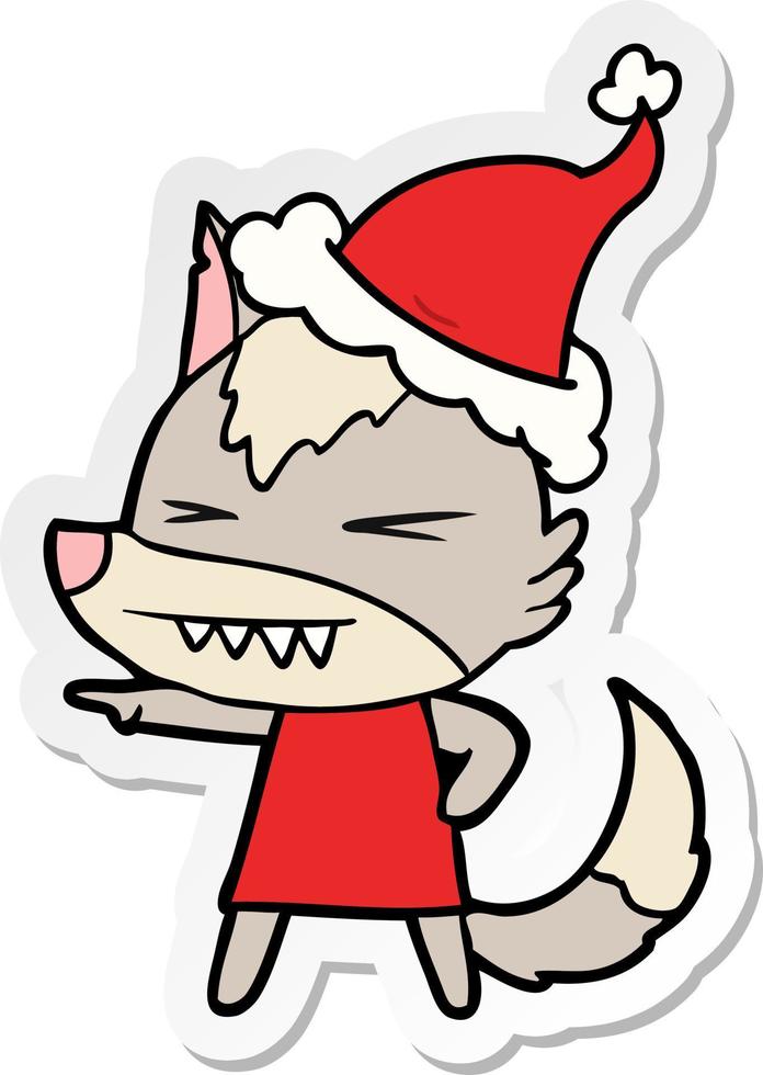 angry wolf sticker cartoon of a wearing santa hat vector