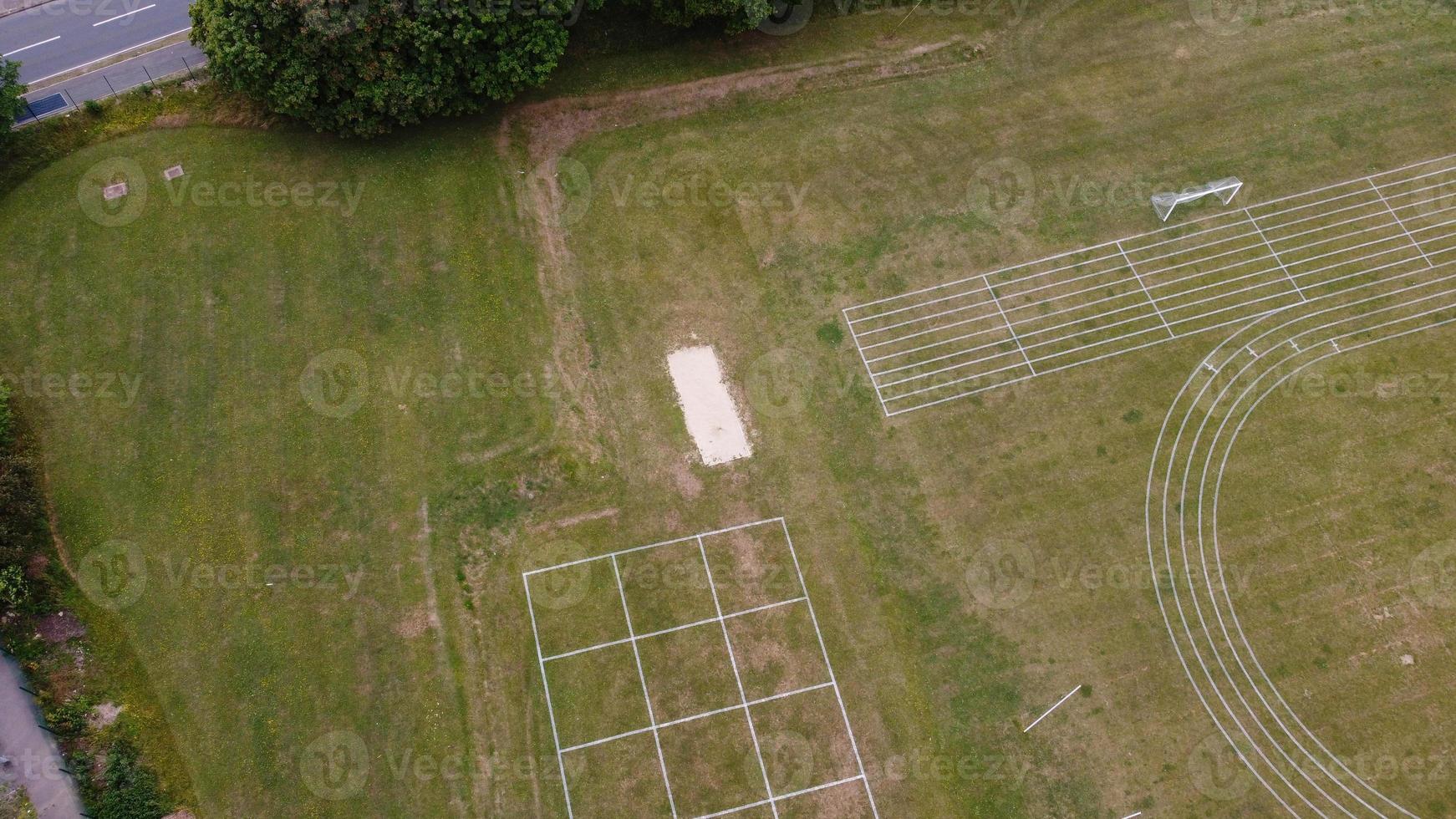 An Aerial Footage and High Angle view of Play Ground of a High School of boys at Luton Town of England, British Motorways and Highways photo