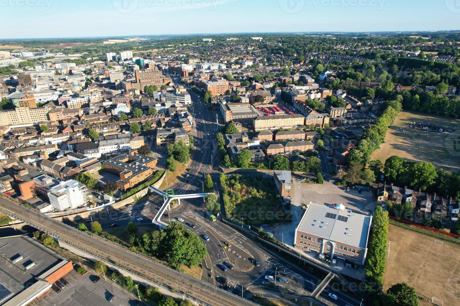 High Angle Drone's View of Luton City Center and Railway Station, Luton England. Luton is town and borough with unitary authority status, in the ceremonial county of Bedfordshire photo