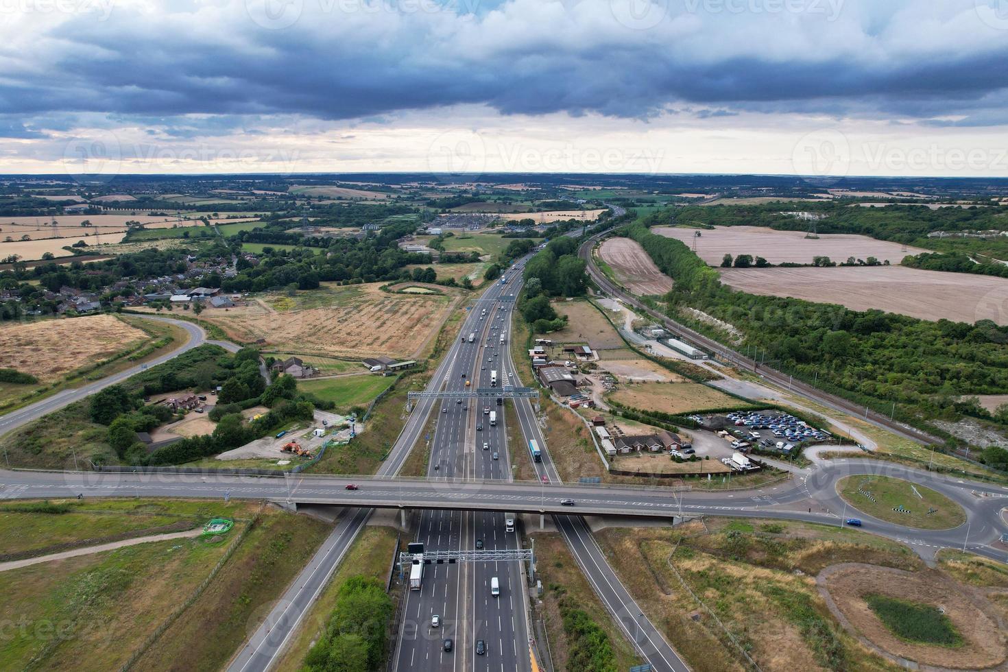Aerial View and High Angle Footage of British Motorways Interchange of M1 Junction 11a at North Luton City of England UK. photo