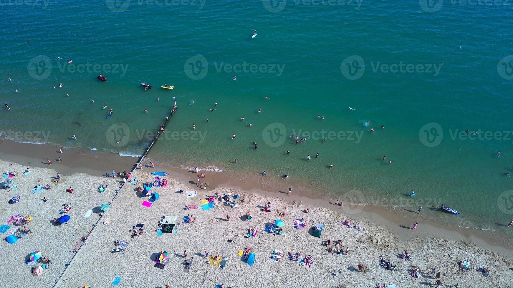 People relaxing at Bournemouth Beach of England UK photo