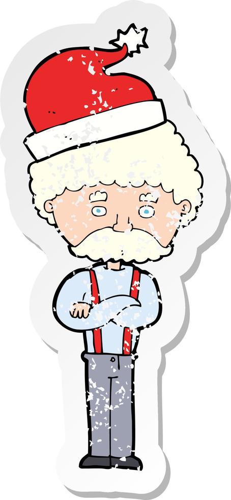 retro distressed sticker of a cartoon old man in christmas hat vector