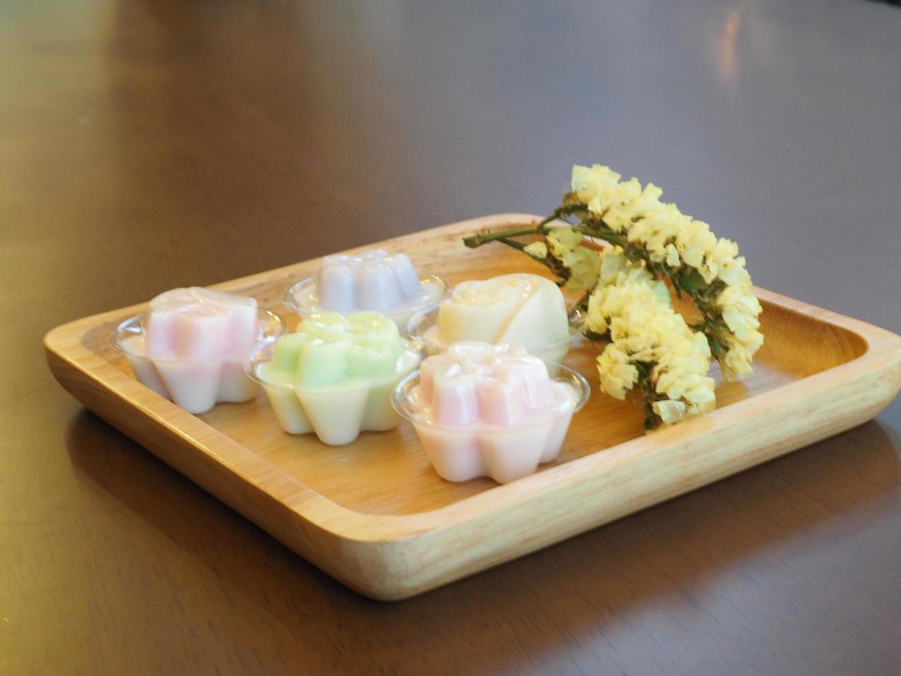 jelly desserts with a set of tea on the table. photo
