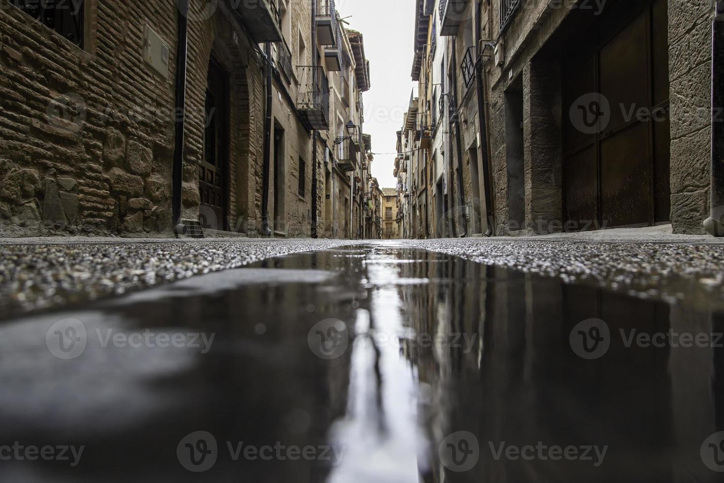 Soil of old wet street photo