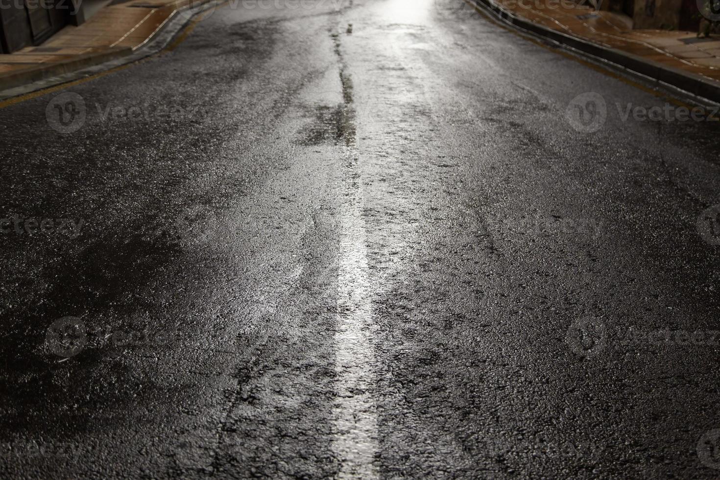 Wet asphalt floor photo