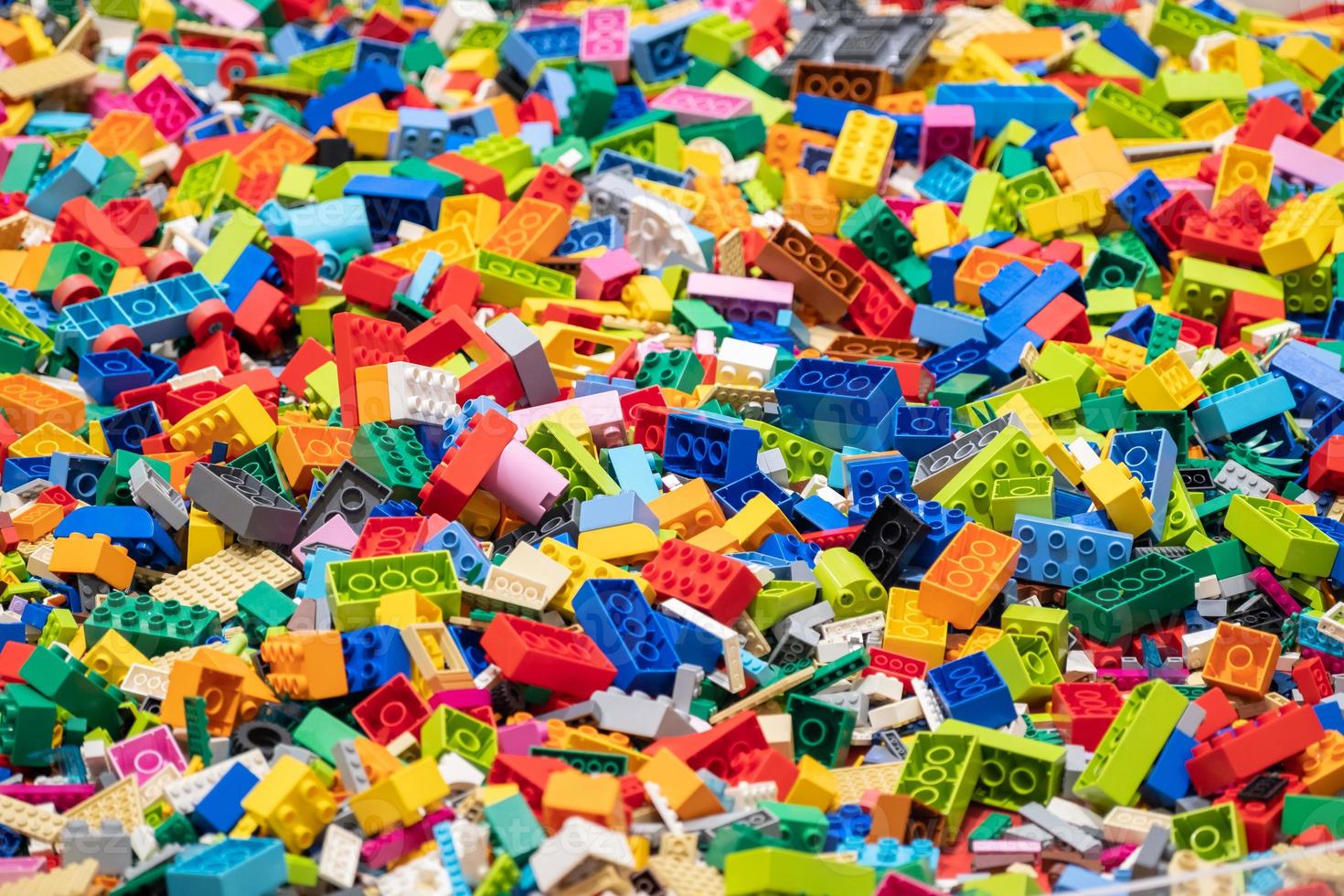 Multicolor of Many Lego toy blocks in different size ,top view. Toys and games. Leisure and recreation photo