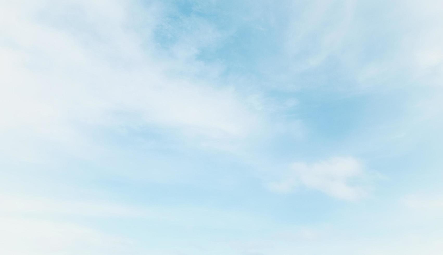 Background of bright sky and background of thin clouds, sky clouds, blue sky and white clouds float in the sky on a clear day. photo