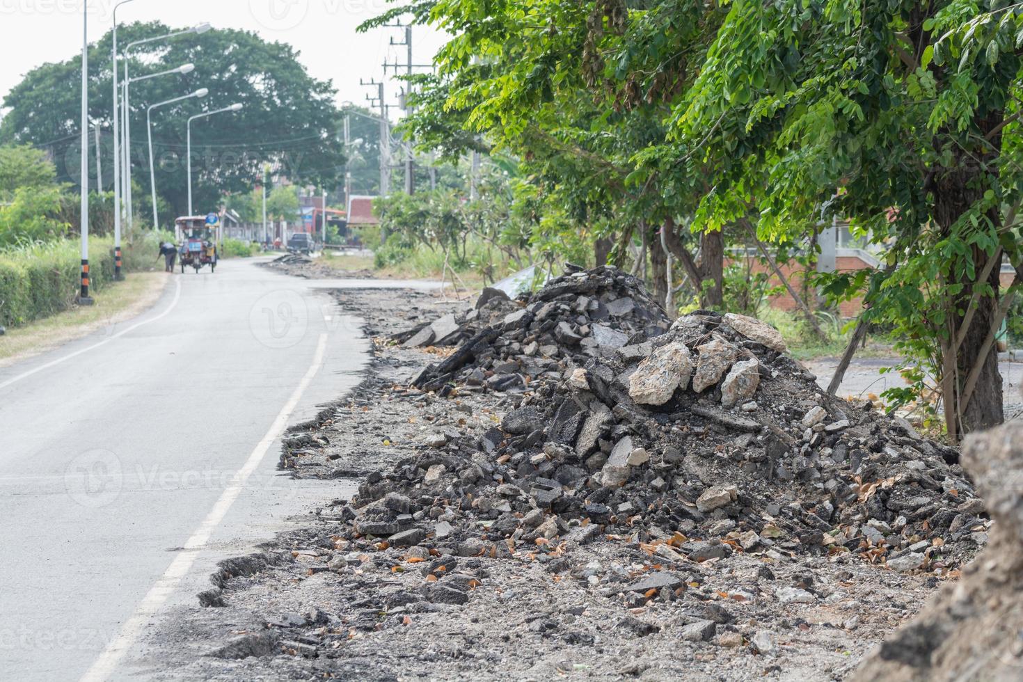 Asphalt surface on the street was demolished due to poor construction. photo