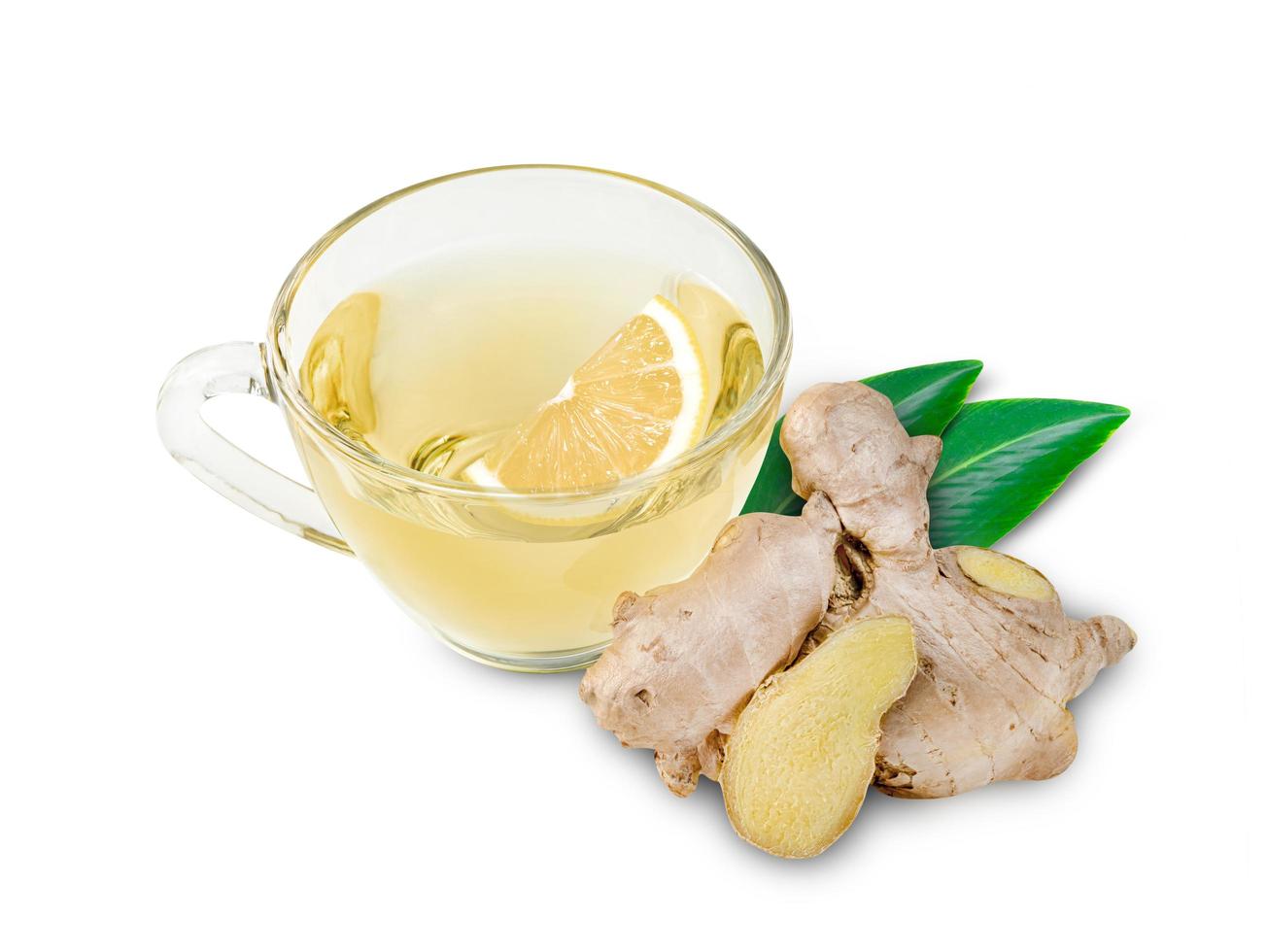 ginger and lemon tea in glass cup and leaves isolated on white background ,Healthy water photo