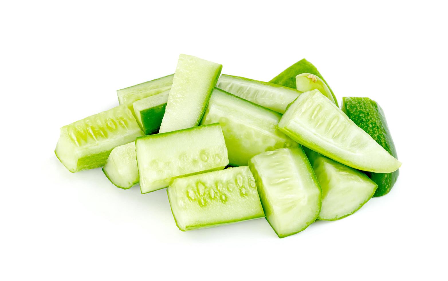 chopped cucumber isolated on white background photo