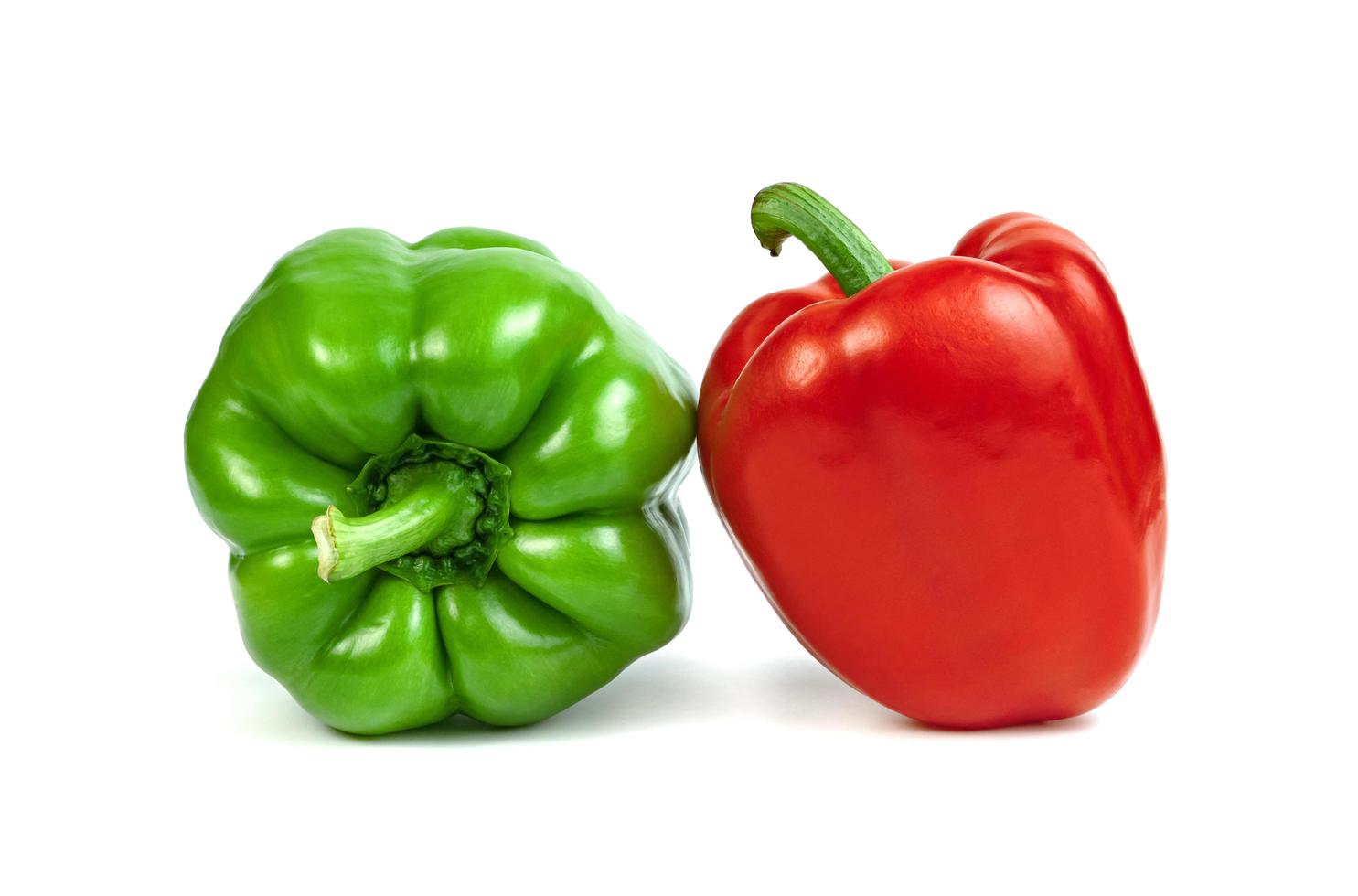 red green sweet bell pepper isolated on white background photo