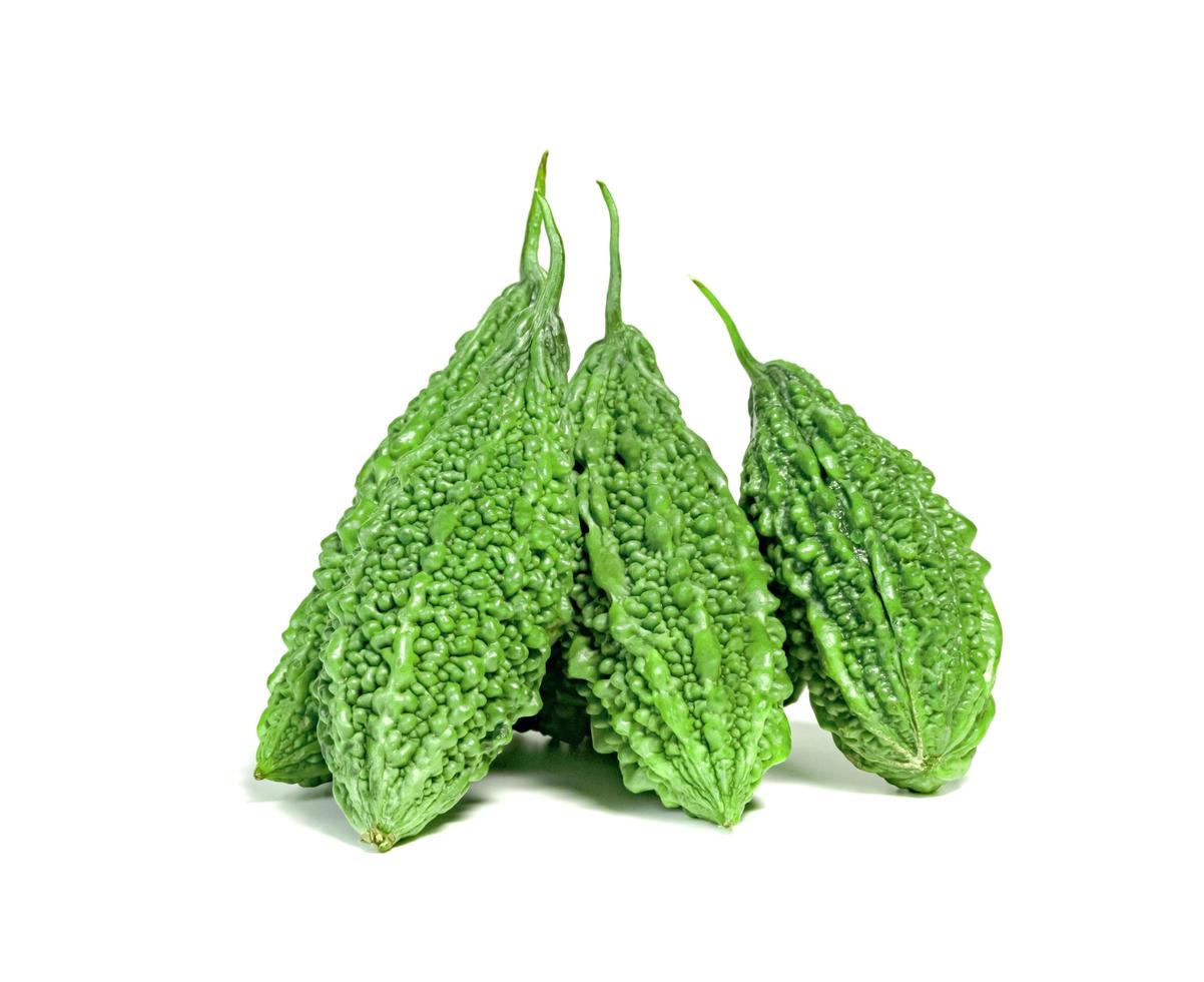 Bitter gourd or Bitter melon or Momordica charantia isolated on white background photo