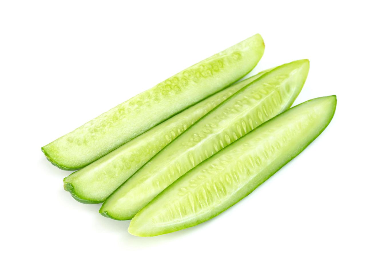 diced cucumber isolated on white background photo
