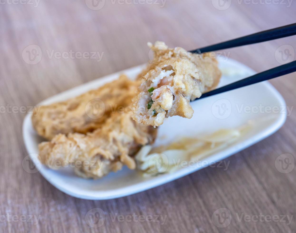 Fried shrimp roll - Taiwanese food cuisine in Tainan, Taiwan restaurant, close up, lifestyle. photo