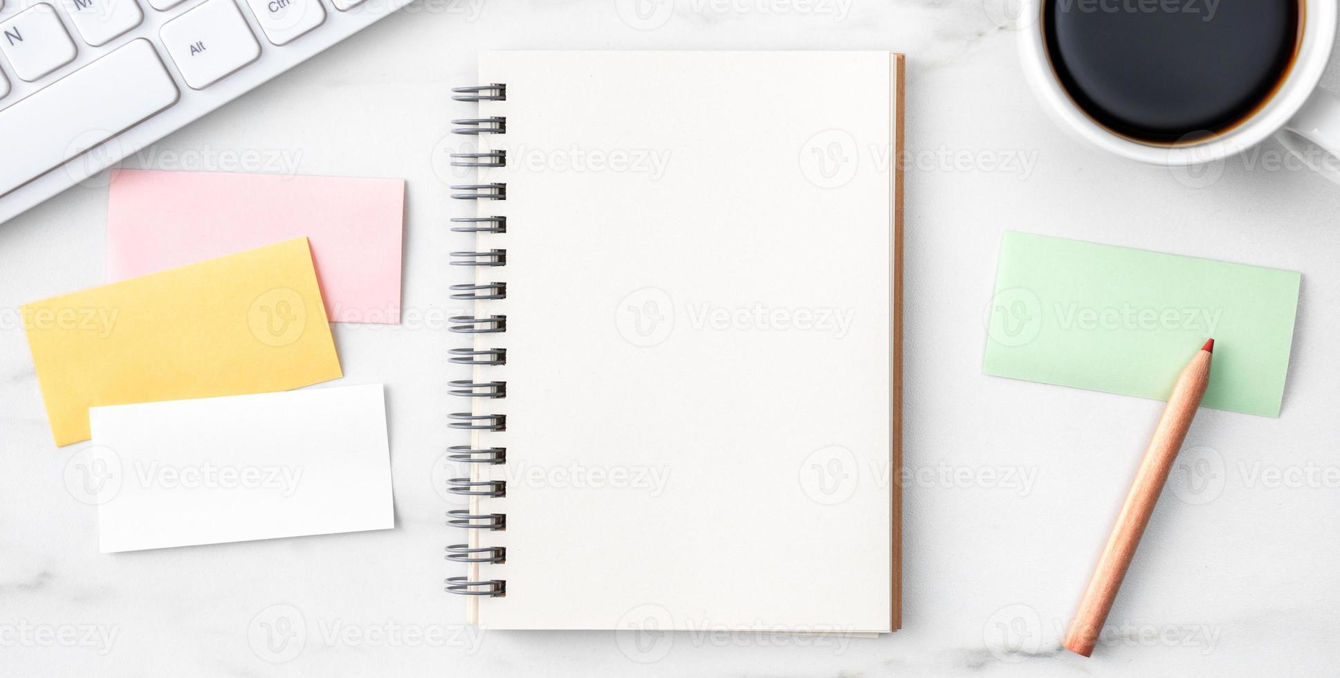 Top view of office table desk cozy work concept on bright marble white background. photo